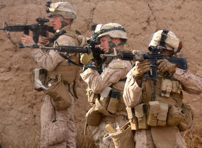 Marines returning small arms fire (Defense.gov photo)